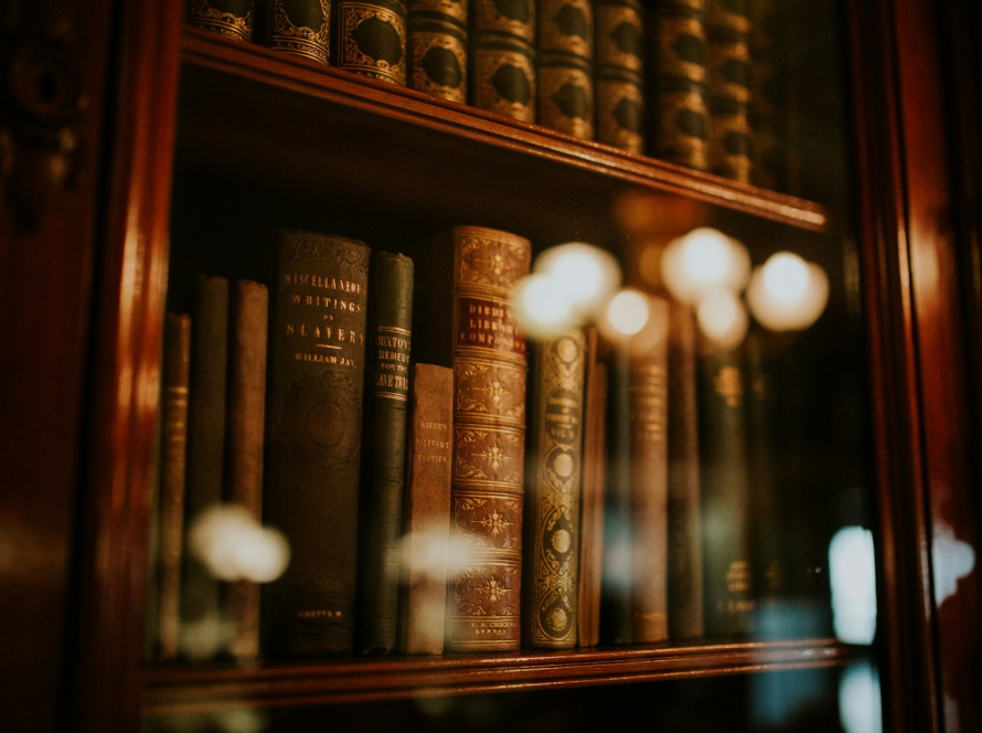 books in glass bookcase