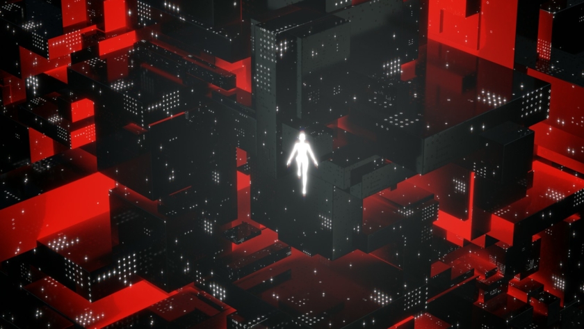 a person walking through a maze of red and black cubes