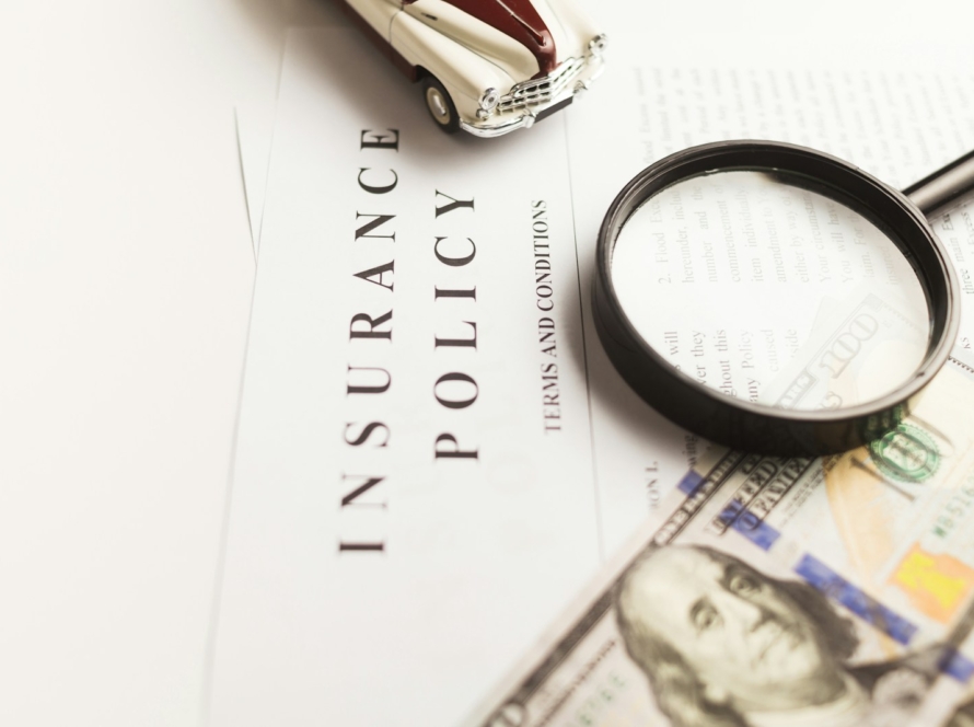 a magnifying glass sitting on top of a piece of paper